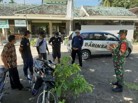 Penyemprotan disinfektan di wilayah Dusun Panjangjiwo